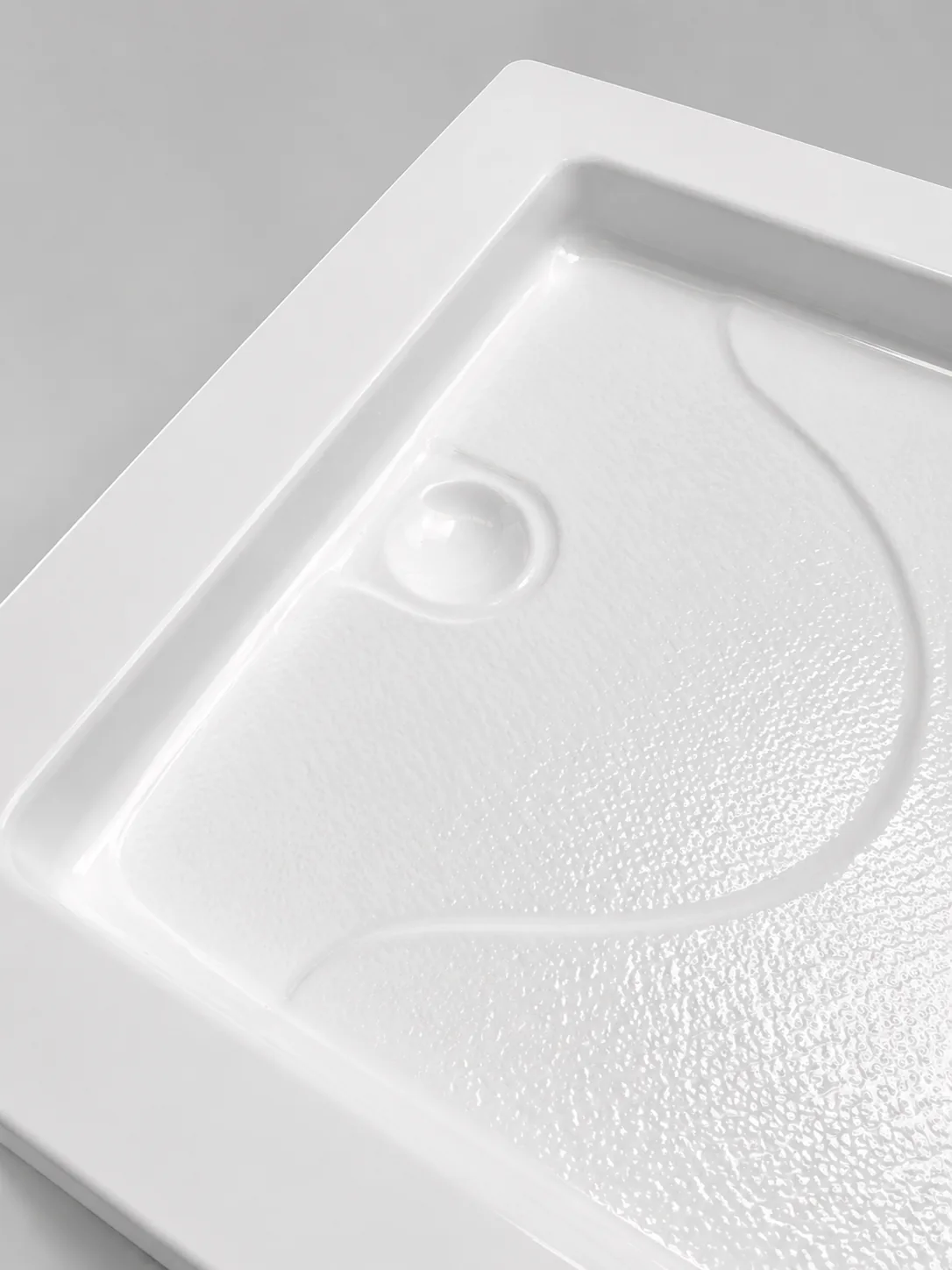 Receptáculo 90x70 antideslizante Carrara, detalle del desagüe